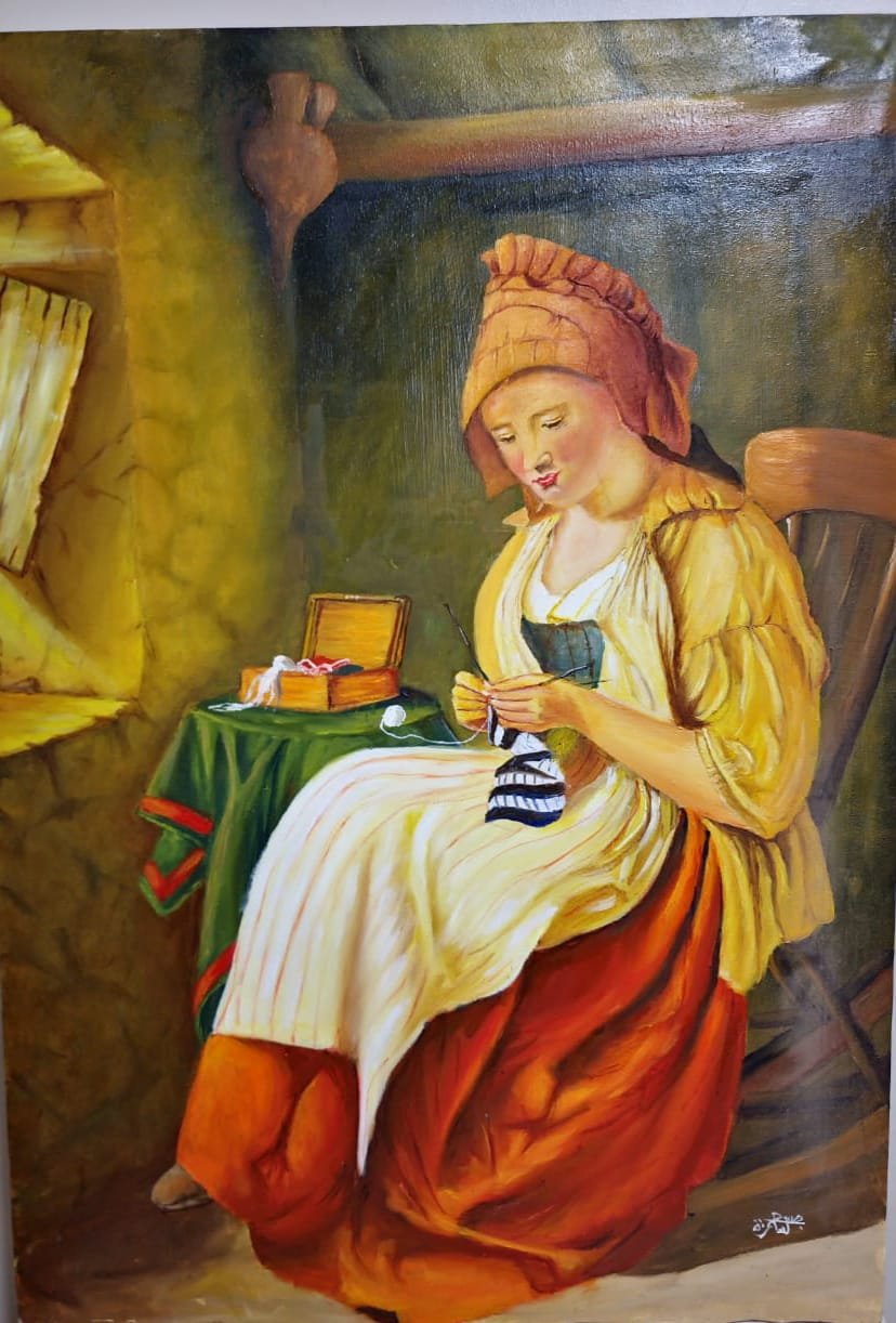 An old French lady sitting Infront of window